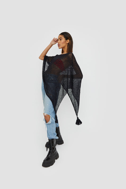 One of our bestsellers is the black poncho, just a simple beautifully made poncho to throw on top of every outfit.